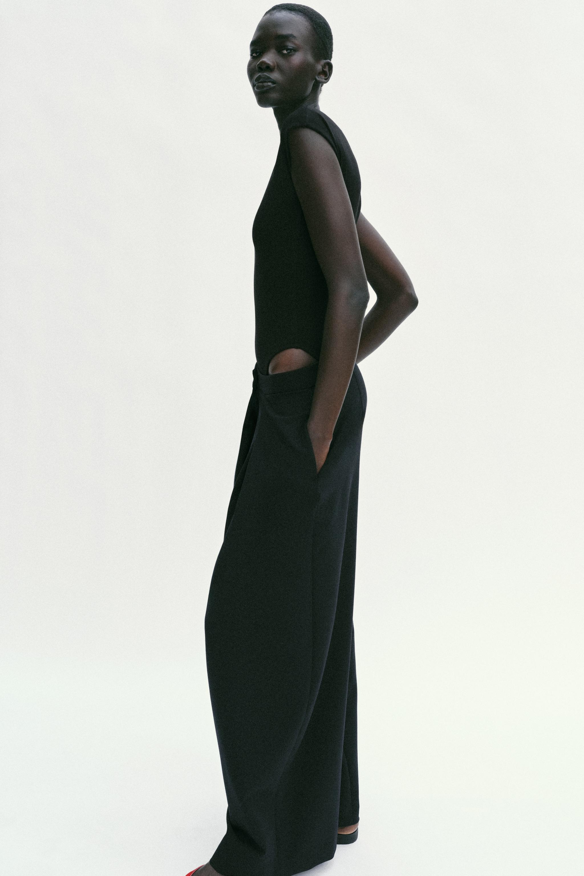 ROUND NECK BODYSUIT